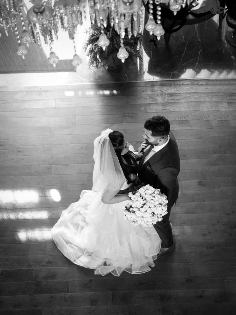 Editorial wedding photography in Kuwait — bride in ivory satin with peony bouquet by Salma Alessa